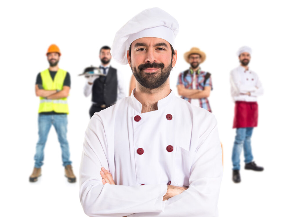 Chef with his arms crossed over white background Chef with his arms crossed over white background